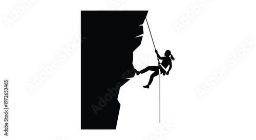 A lone rock climber ascends a sheer cliff face depicted in stark contrast as a silhouette high quality