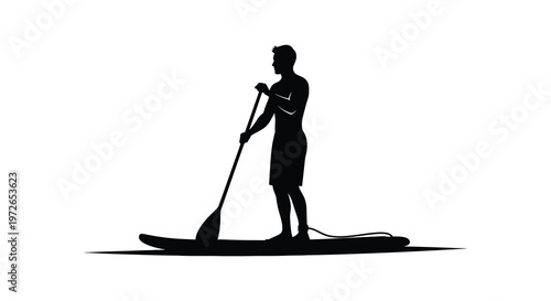 A man stands on a paddleboard holding a paddle depicted as a striking black silhouette high quality professional