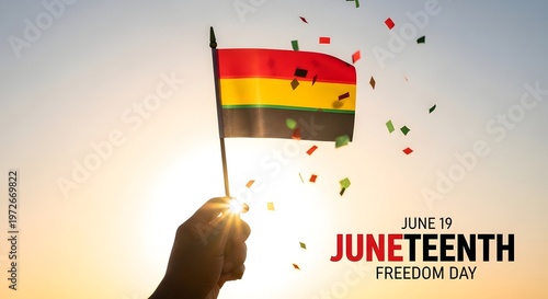 Foto Juneteenth freedom day with hand holding flag