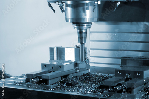 Metal processing machine. Machining center. CNC vertical machining center. Computer control. Metal milling equipment. Metal shavings. Machines production tools Industrial