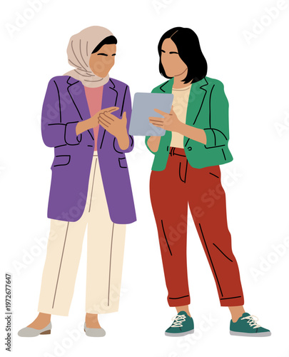 Two women stand close, engaged in conversation. One holds a tablet, suggesting shared focus. Their attire shows modern, professional style. Soft colors reflect calm, collaborative energy