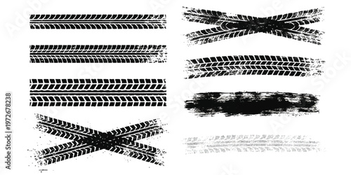 A collection of black tire track imprints arranged in various straight and intersecting patterns