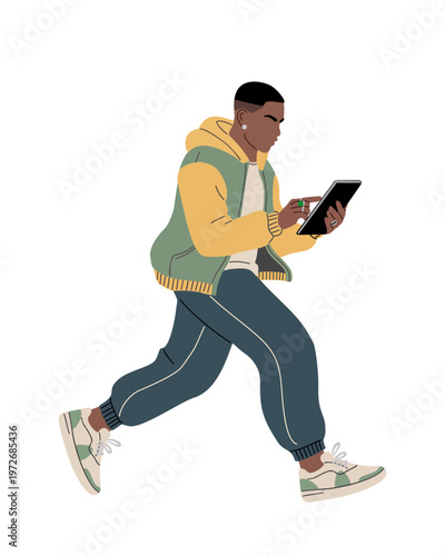 Black man runs forward holding tablet. He wears hoodie and sneakers, focused on screen. His pace suggests urgency or enthusiasm. Ideal for tech, education, or urban lifestyle themes