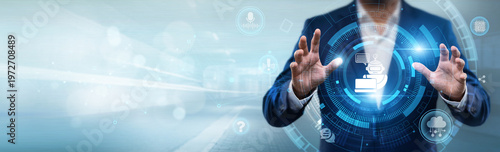 Businessman holding chatbot interface with networking data, AI communication, automated customer service, digital assistant and business support concept