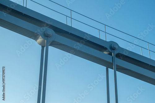 Pinned hanger connection on a steel bridge in blue sky close up