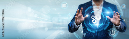 Slika na platnu Businessman holding settings interface with networking data, system configuratio