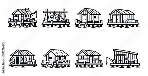 Small stilt houses and fishing platforms on shallow water