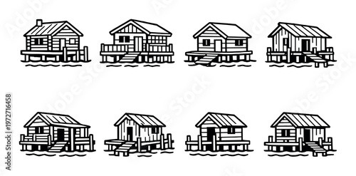 Collection of rustic stilt cabins and small wooden shacks