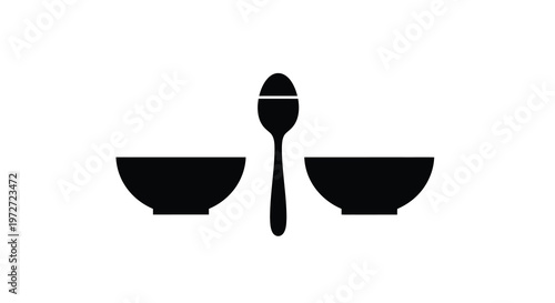 Minimalist depiction of a spoon positioned between two black bowls