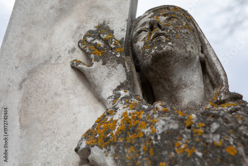 Ancient Mossy Stone Angel Statue At Bernardine Cemetery Vilnius Lithuania