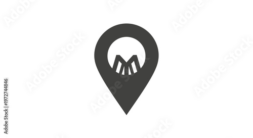 Dark grey map pin icon with a stylized 'M' or mountain shape inside a circular cutout, on a white background, representing location or a specific place.