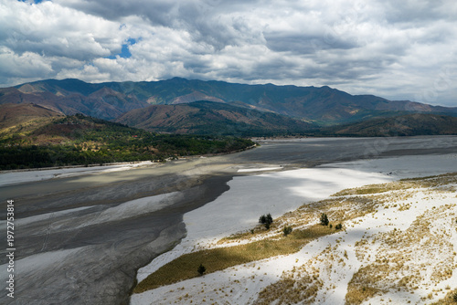 Scenic Aerial Panorama Drone Picture of the Bucao River and mountain range and Mount Katung-uhan, with Volcanic Ash in Botolan, Zambales in the Philippines