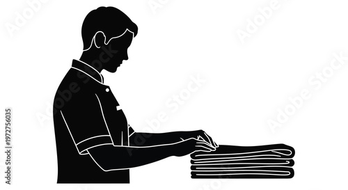 A man s profile is captured as he folds laundry presenting a striking black and white silhouette high quality professional detailed modern