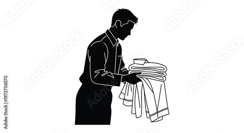 A man folds laundry depicted in a stark black and white style creating a dramatic silhouette high quality professional detailed modern