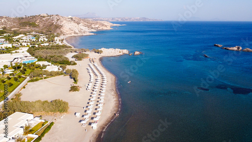 High Angle Aerial View of Agios Stefanos Beach with Long Sandy Shore and Turquoise Sea in Kos Greece