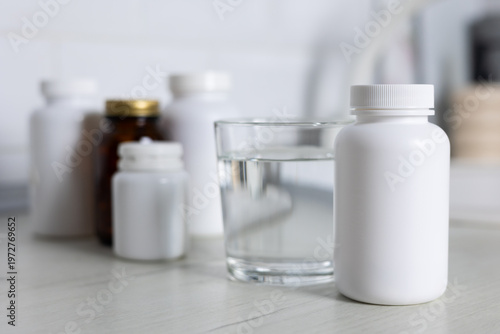 Stylish Presentation Of Health Supplement Containers With Emphasis On Safety And Organization