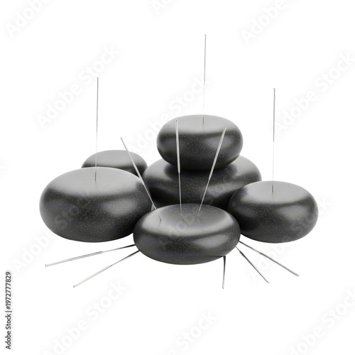 Acupuncture needles on smooth stones