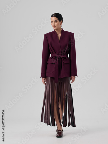 Fashion shooting in studio . Professional model , fashionable clothes and style, new collection. stylish look