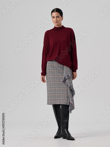 Fashion shooting in studio . Professional model , fashionable clothes and style, new collection. stylish look