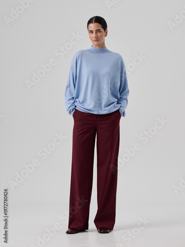 Fashion shooting in studio . Professional model , fashionable clothes and style, new collection. stylish look	