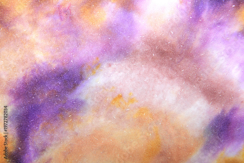 Bright background of multi-colored stains on paper