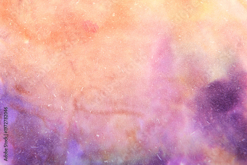 Bright background of multi-colored stains on paper