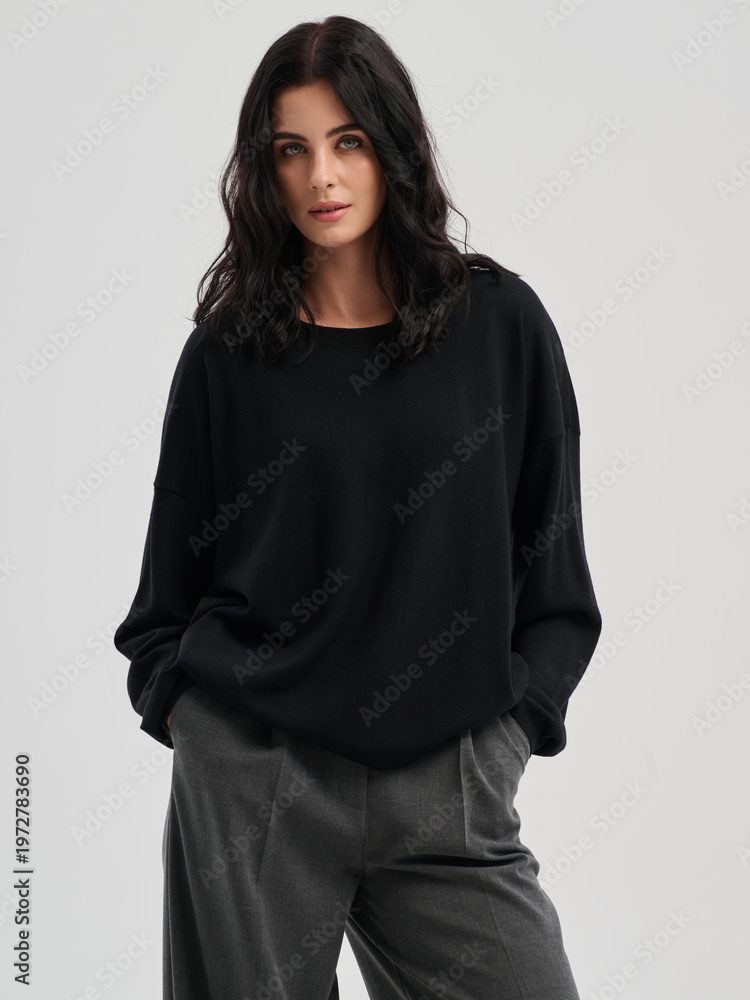 Fototapeta premium Fashion shooting in studio . Professional model , fashionable clothes and style, new collection. stylish look 