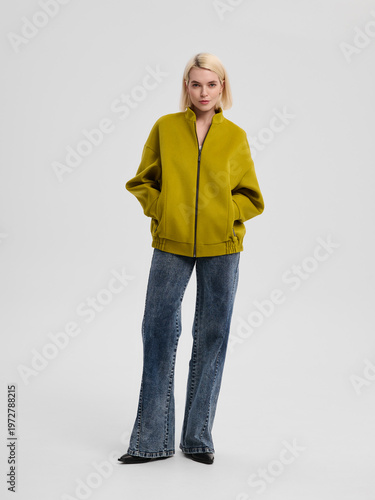 Fashion shooting in studio . Professional model , fashionable clothes and style, new collection. stylish look	