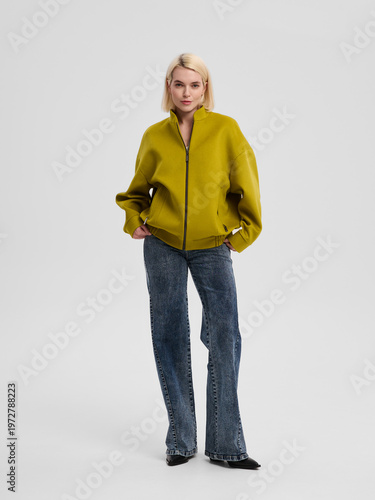 Fashion shooting in studio . Professional model , fashionable clothes and style, new collection. stylish look	