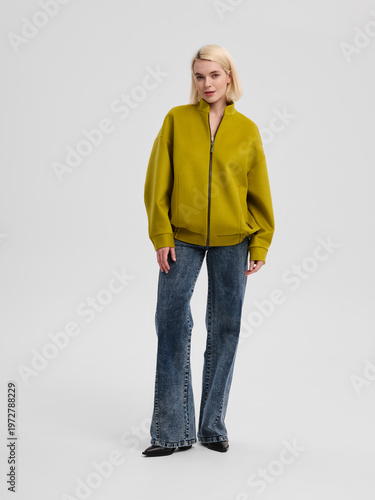 Fashion shooting in studio . Professional model , fashionable clothes and style, new collection. stylish look	