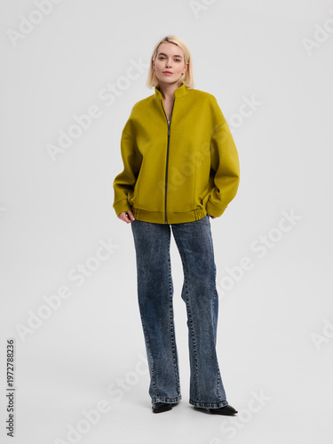 Fashion shooting in studio . Professional model , fashionable clothes and style, new collection. stylish look	