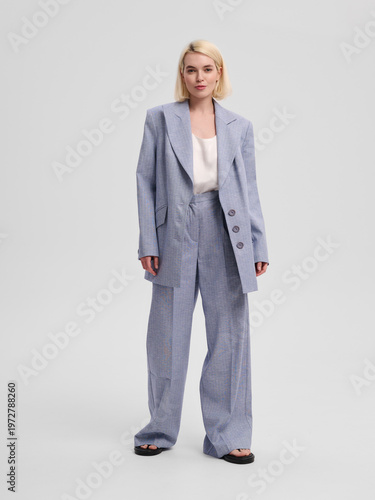 Fashion shooting in studio . Professional model , fashionable clothes and style, new collection. stylish look	