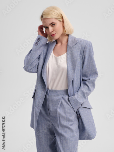 Fashion shooting in studio . Professional model , fashionable clothes and style, new collection. stylish look	