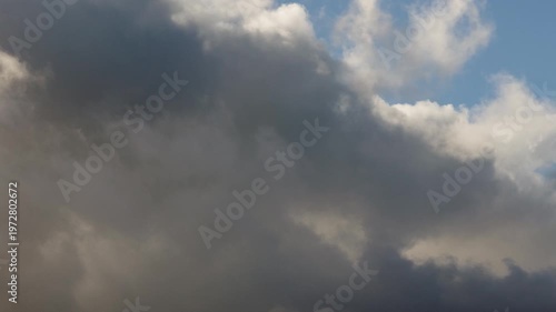 Dramatic Timelapse of Dark Clouds Moving Across Sky.