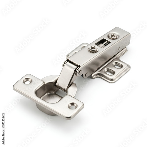 Closeup of a shiny metal hinge for cabinet doors and furniture.