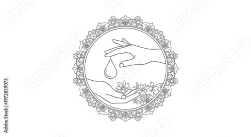 Hand with drop of water and flower.