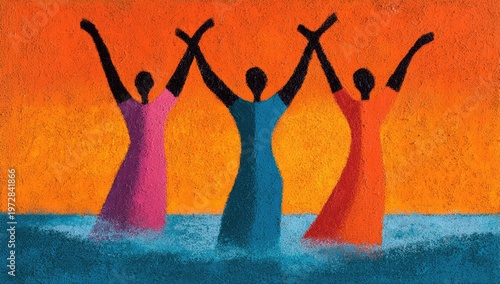 Three diverse women in colorful dresses celebrating with arms raised in water.