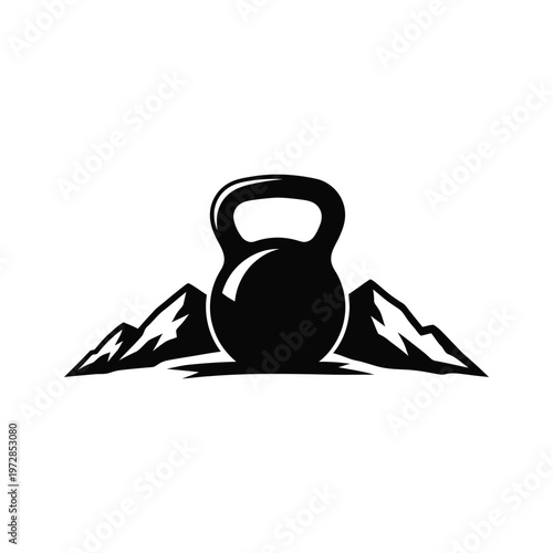 A kettlebell sits prominently in front of majestic mountains.