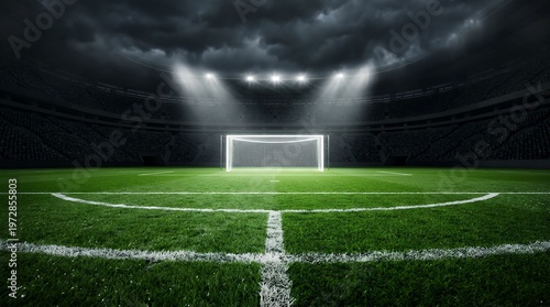 Illuminated Soccer Goal on Green Field Under Dramatic Night Stadium Lights