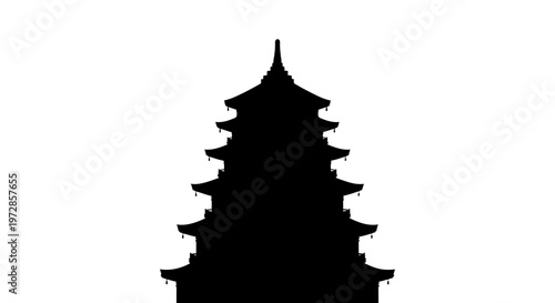 Silhouette of Ancient Temple: A majestic pagoda stands silhouetted against a plain backdrop, its layered eaves and intricate structure hinting at a rich cultural heritage. 