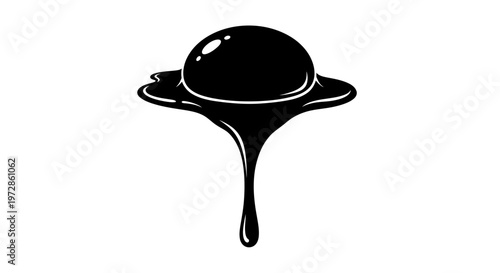 Black Ink Drop: A captivating close-up showcases a droplet of deep black ink, poised in mid-air and beginning to fall.
