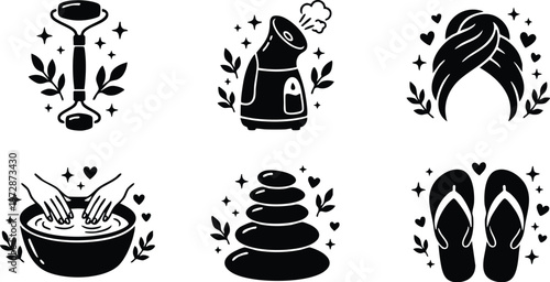 Black and white spa icons with facial roller steamer towel hand care stones and slippers