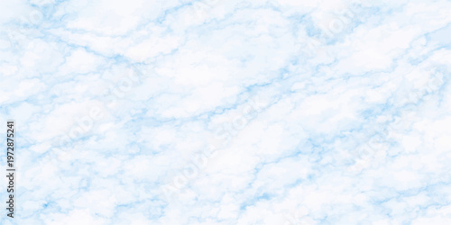 A beautiful clear blue sky with fluffy white cumulus clouds creates a bright natural cloudscape on a sunny summer day