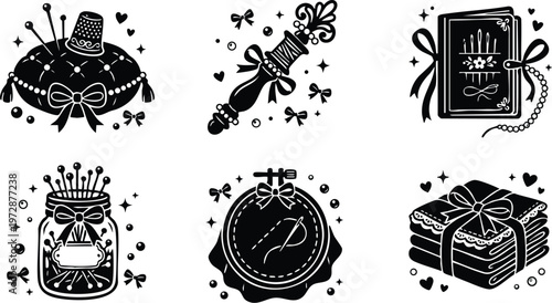 Black and white pincushion thimble pins jar of needles embroidery hoop sewing kit stack of folded fabric art