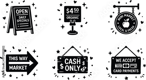 Black and white market signs with open daily specials cash only and card payments messages