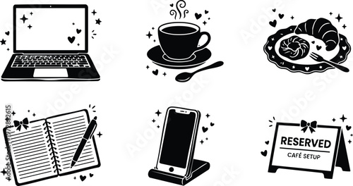 Laptop cup croissant notebook phone and reserved sign cafe setup