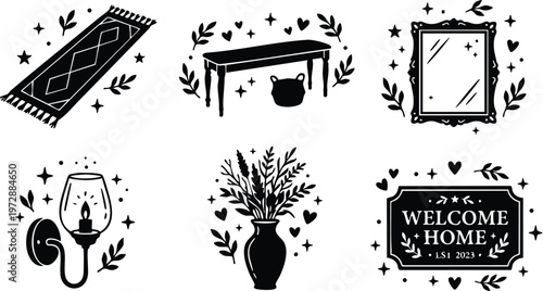 Black and white home decor icons with welcome home sign candle mirror and vase