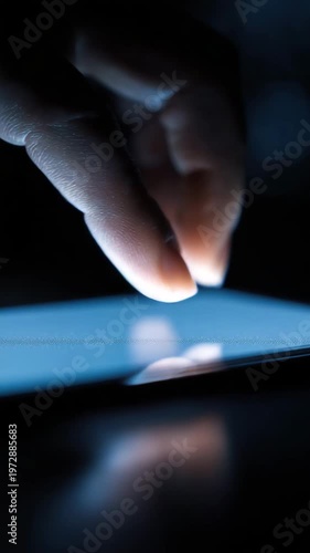 Person using smartphone with warm bokeh background