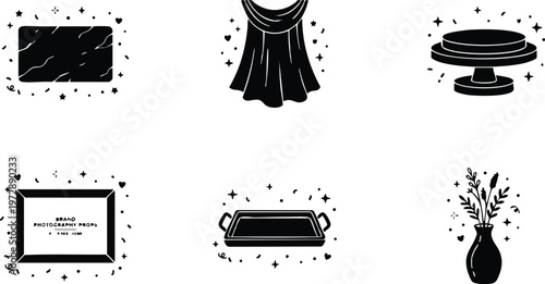 Black and white flat kitchen and home decor items set with marble cutting board and flower vase