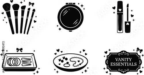 Black and white vanity essentials wordmark with makeup brushes compact jewelry and lip gloss icons